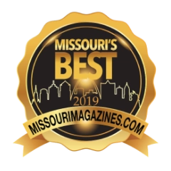 A gold and black award badge with a city skyline silhouette, reading "Missouri's Best 2019" and "missourimagazines.com" on a ribbon across the bottom.